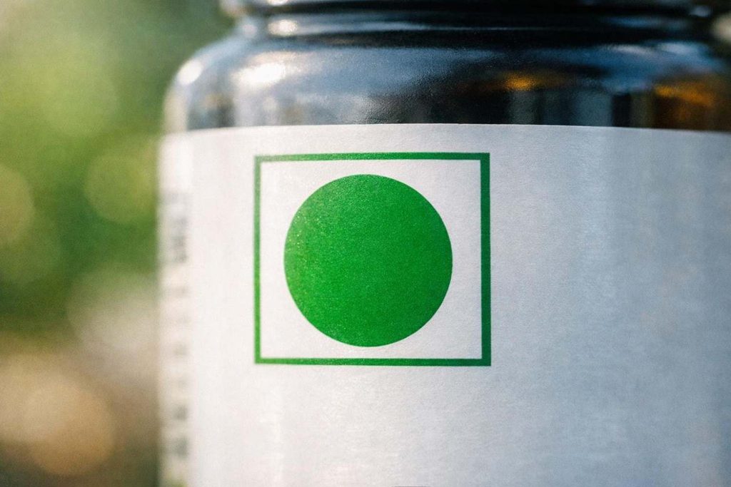 Green dot vegetarian symbol on supplement label